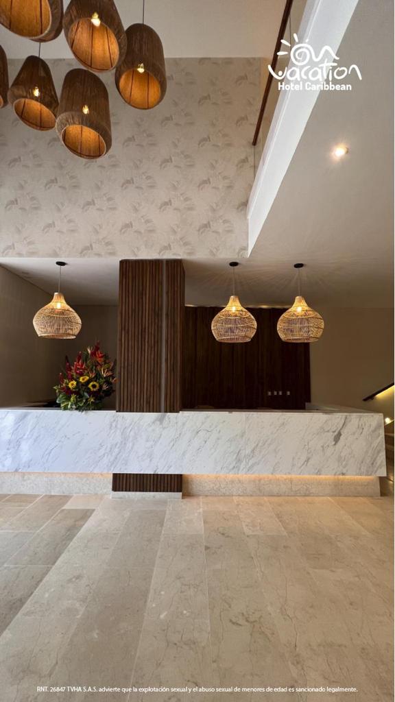 Recepción del Hotel Caribbean la cual podrás disfrutar con nuestros planes turísticos